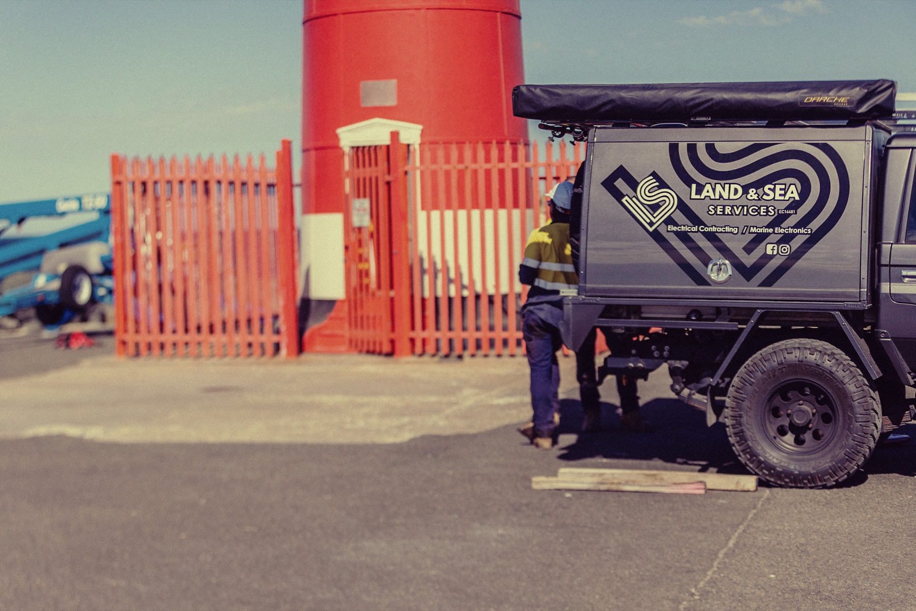 Land and Sea field vehicle at an aid to navigation site